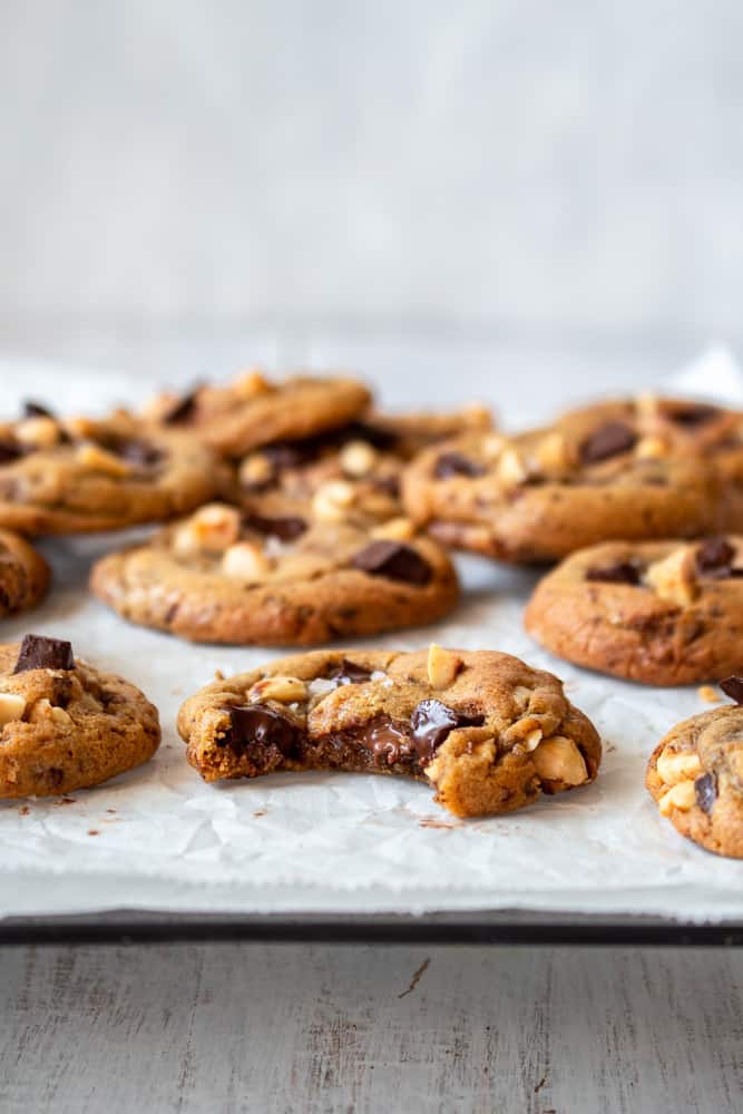 Does it get any more classic than chocolate chip cookies? These chocolate chip cookies are THE BEST with browned butter, dark chocolate chunks, and toasted hazelnuts! Crispy edges and soft chewy centers, of course! #chocolatechipcookies #chocolatechunk #homemadecookies #darkchocolate #cookiecereal