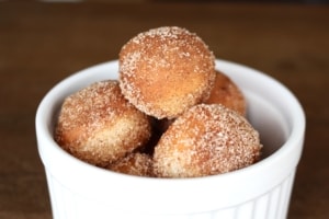 Did you know you can make fluffy and delicious yeasted doughnuts in a bread machine? These homemade doughnuts are going to knock your socks off! Glazed, dipped into chocolate, or covered in cinnamon sugar, do what you want! Go nuts with your doughnuts! #donuts #doughnuts #fluffy #homemade #yeasted #glazed #chocolate #sprinkles #doughnutholes #timbits #dunkindonuts #krispykreme #timhortons #breadmachines #fried