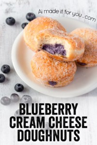 Super fluffy melt-in-your-mouth doughnuts, or donuts, that come together in a bread machine! They’re filled with a delicious blueberry cream cheese filling! #blueberry #creamcheese #doughnuts #donuts #breadmachine