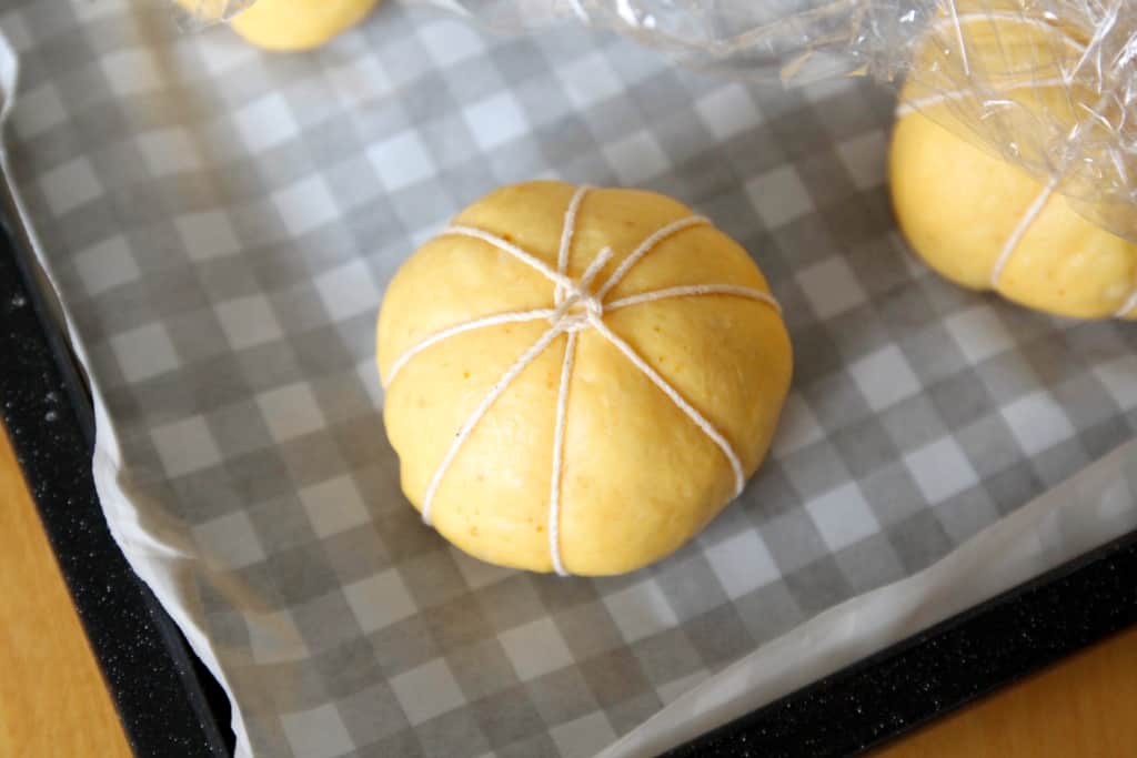 The buns have canned pumpkin in the dough, but the flavor is subtle. Instead they look like cute little pumpkins!