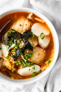 Kimchi soup with Korean tteok rice cakes is spicy, easy, and delicious! #kimchisoup #probiotics #spicysoup #Koreanfood #healthymeals