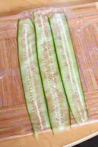 Sliced cucumbers laid on rice paper