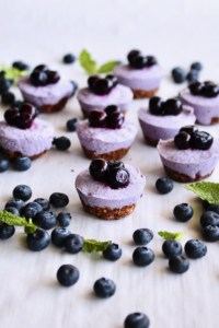 Vegan Blueberry Cheesecake Bites - They’re rich, creamy, and delicious, but dairy free and gluten free! Guilt free too! And when everything comes together in a blender, you really can’t complain! #vegan #vegancheesecake #cheesecakebites #blueberry #blueberrycheesecake #minidessert #dessert #frozendessert #tart #cashew #coconutyogurt #coconut #hotforfood