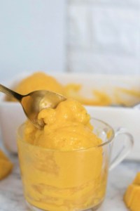 This mango lime sorbet is one of the healthiest and most indulgent desserts for the upcoming hot summer days! Super easy, needing only two ingredients and a food processor! #mango #lime #sorbet #healthy #twoingredient #2ingredient #summer #icecream #nicecream #gelato #frozen #frozendessert