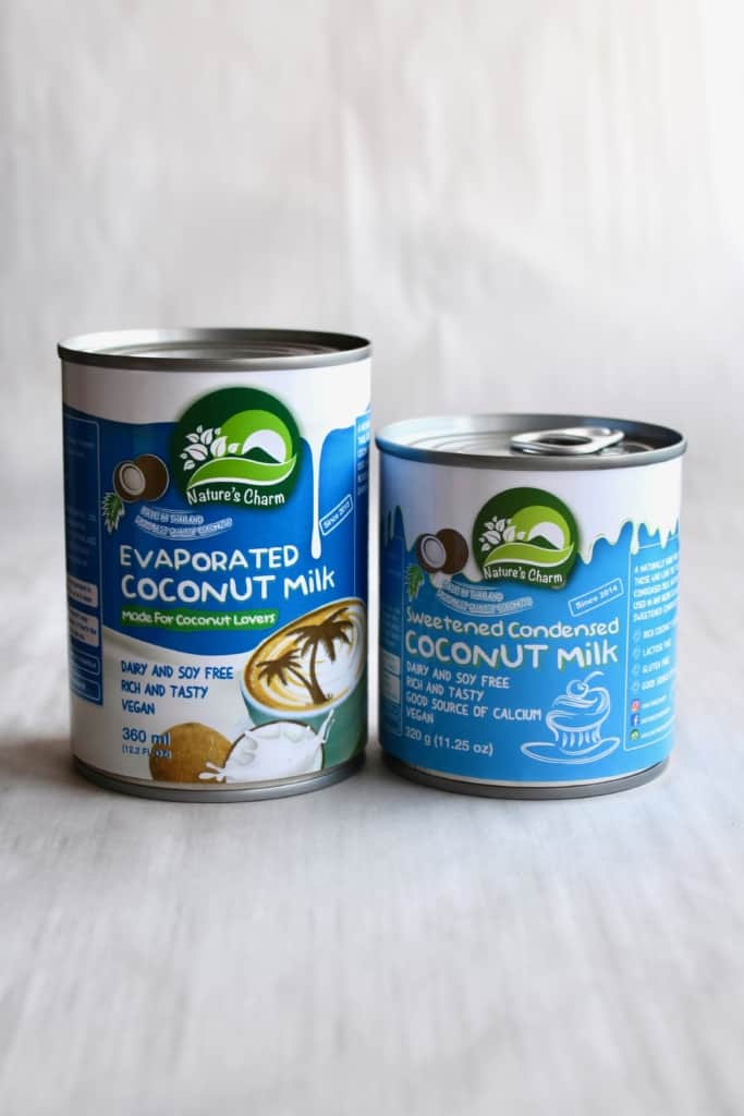Cans of Nature's Charm condensed coconut milk and evaporated coconut milk
