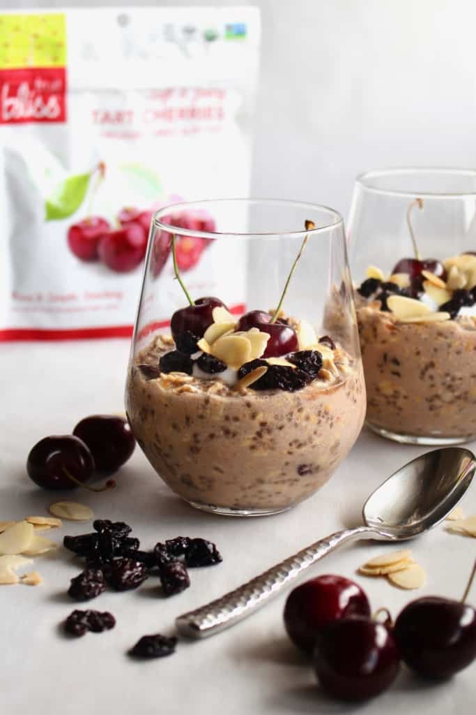 Switch up your oatmeal game by making this overnight oats with tart cherries and almonds! The addition of dried tart cherries brings a refreshing twist to the classic creamy oatmeal breakfast. #overnightoats #oatmeal #cherry #cherries #driedfruit #driedcherries #almond #almondmilk #chiaseeds #chia #organic #fruitbliss #fiber #healthy #weightloss #giveaway #sweepstake #recipe