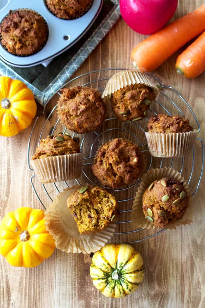 Pumpkin morning glory muffins are an amazing breakfast treat! These vegan morning glory muffins are made with whole wheat flour but thanks to the canned pumpkin, they’re super moist! They’re also the best way to use up leftover pumpkin from the holidays! #morningglory #muffins #vegan #vegetarian #dairyfree #eggfree #raisinfree #noraisin #gratedcarrots #carrot #apple #pumpkin #pumpkinmuffins #holidays #leftovers #thanksgiving #christmas #coconut #shreddedcoconut #wholegrains #wholewheat #flour #moist #breakfast