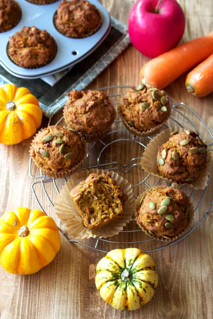 Pumpkin morning glory muffins are an amazing breakfast treat! These vegan morning glory muffins are made with whole wheat flour but thanks to the canned pumpkin, they’re super moist! They’re also the best way to use up leftover pumpkin from the holidays! #morningglory #muffins #vegan #vegetarian #dairyfree #eggfree #raisinfree #noraisin #gratedcarrots #carrot #apple #pumpkin #pumpkinmuffins #holidays #leftovers #thanksgiving #christmas #coconut #shreddedcoconut #wholegrains #wholewheat #flour #moist #breakfast