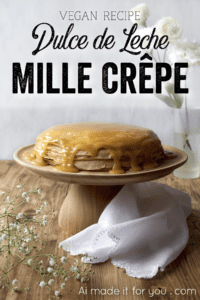 Coconut whipped cream sandwiched between layers of delicious crêpes, then topped with rich homemade dulce de leche! Whether you call it gâteau de crêpes, mille crêpe, or crepe cake, this is a beautiful and impressive dessert! #french #crepecake #crepes #pancakes #gateau #millecrepe #dulcedeleche #coconut #dairyfree #condensedmilk #caramel #cake