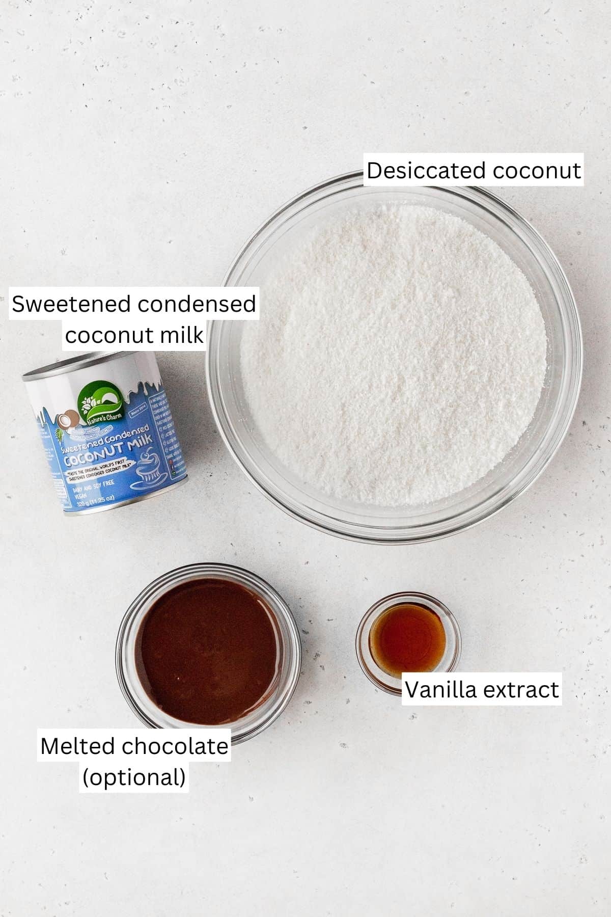 Ingredients for making vegan macaroons measure out into bowls.