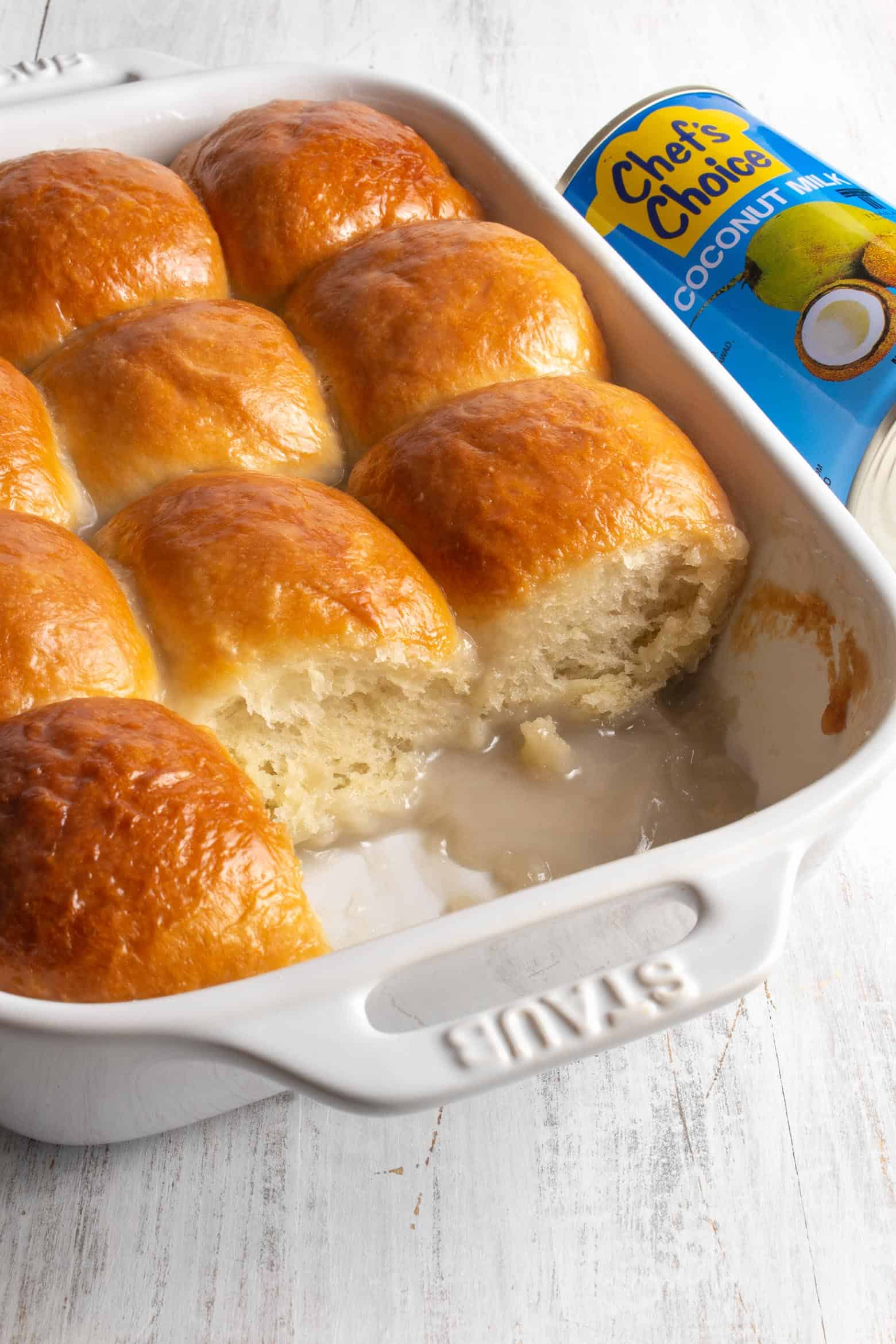 Sweet coconut buns in a baking dish.