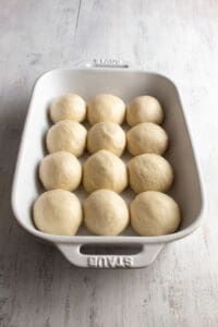 Balls of dough in a baking pan
