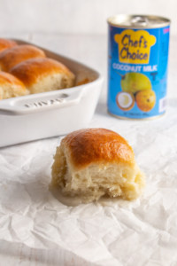 If you need a change from your regular homemade bread rolls, make vegan pani popo! These Samoan sweet coconut milk buns are baked in a yummy coconut sauce! #veganbread #panipopo #coconutmilk #milkbread #homemadebread