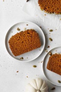 Dairy free pumpkin loaf slices on plates
