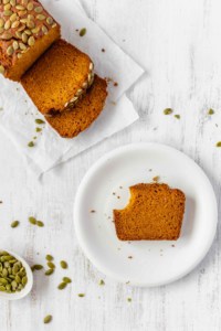 This pumpkin bread is super moist thanks to the maple syrup! It's not too sweet and dairy-free! Perfect with a cup of coffee or tea! #pumpkinrecipe #pumpkinbread #pumpkinloaf #pumpkinspice #pumpkinpiespice #pepitas