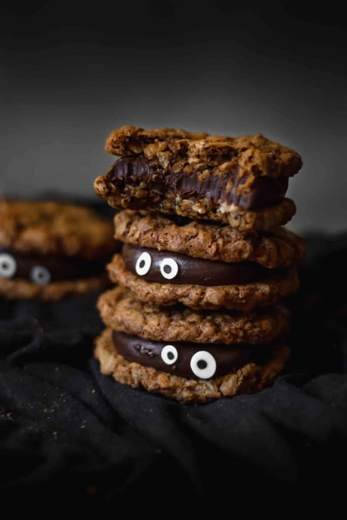 Chocolate fudge sandwiched between two oatmeal cookies make for a delicious and spooky treat!