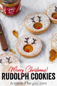 Creamy Biscoff spread is sandwiched between two buttery cookies and decorated to look like Rudolph! Cute and minimalist Christmas cookies! #rudolph #rudolphcookies #christmascookies #cookieexchange