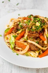Thai curry paste and jackfruit confit adds spice and flavor to this Japanese fried noodle dish! #yakiudon #udonnoodles #vegannoodles #veganfastfood #plantbased