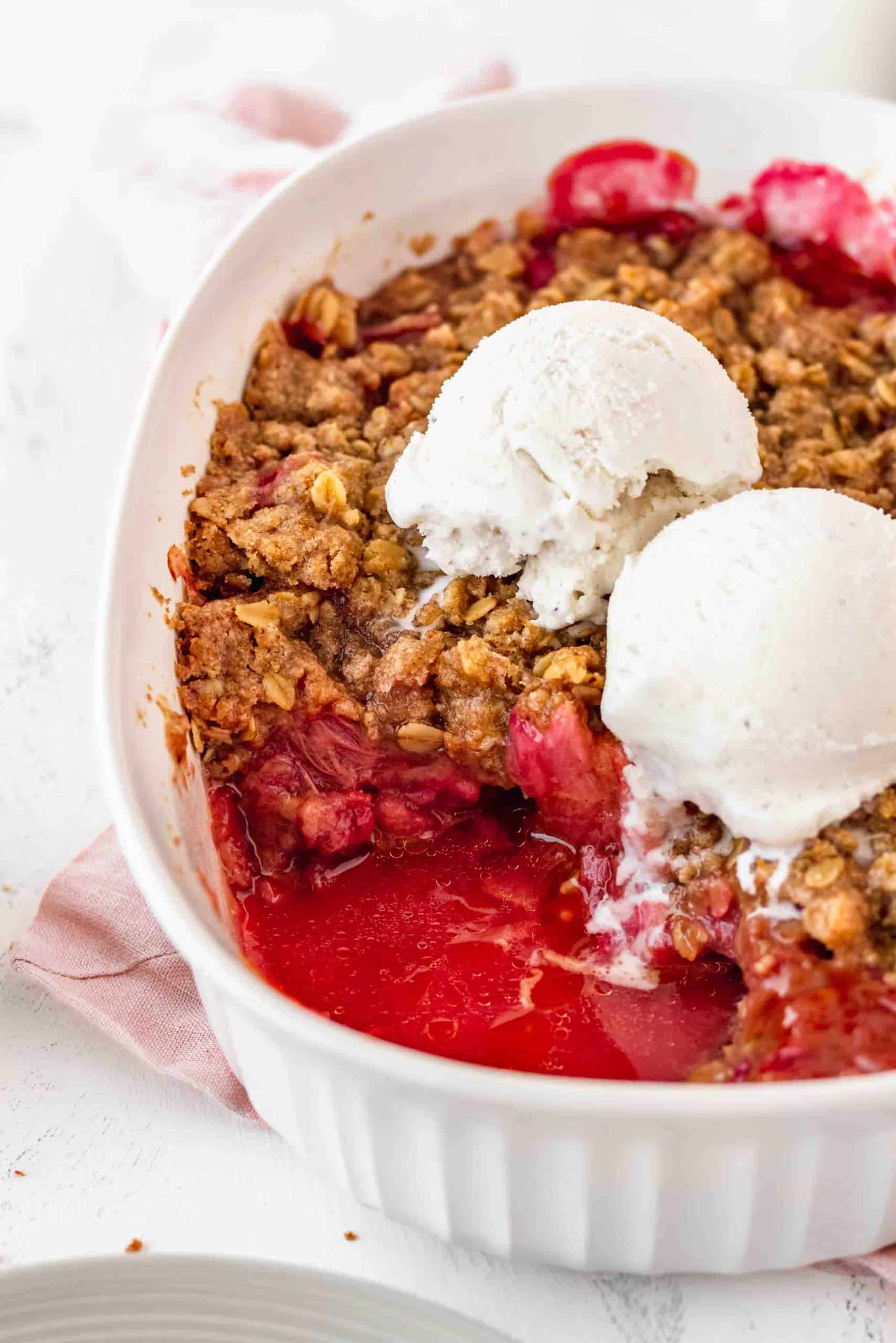 Rhubarb crisp with a portion taken out