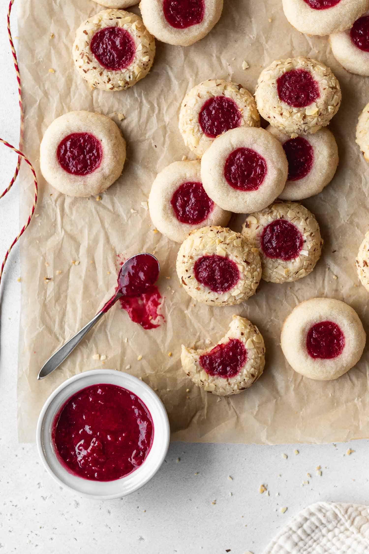 Cranberry cookies stacked on parchment paper