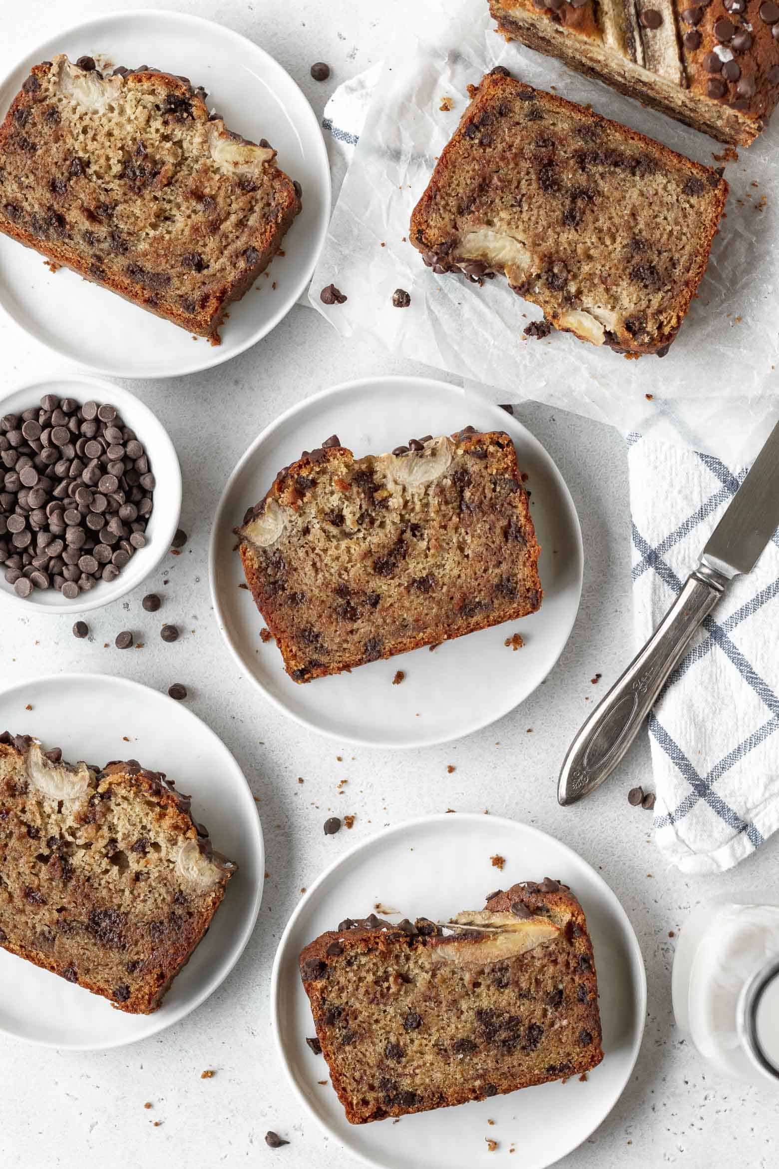 Slices of gluten free chocolate chip banana bread on plates