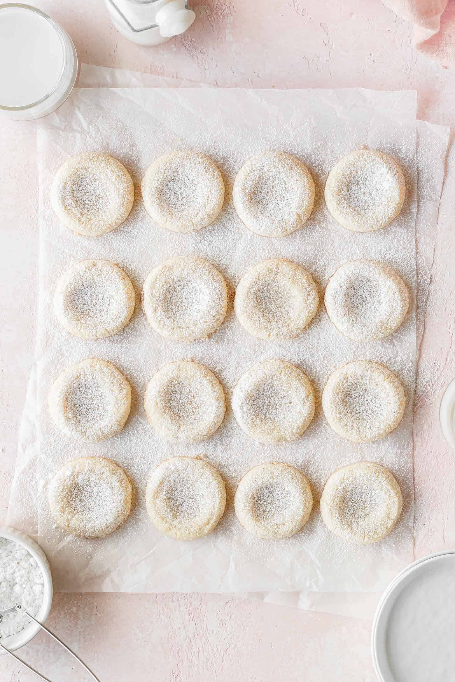 Vegan cookies dusted with powdered sugar.