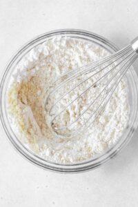 Whisk together flour and almond flour in a bowl