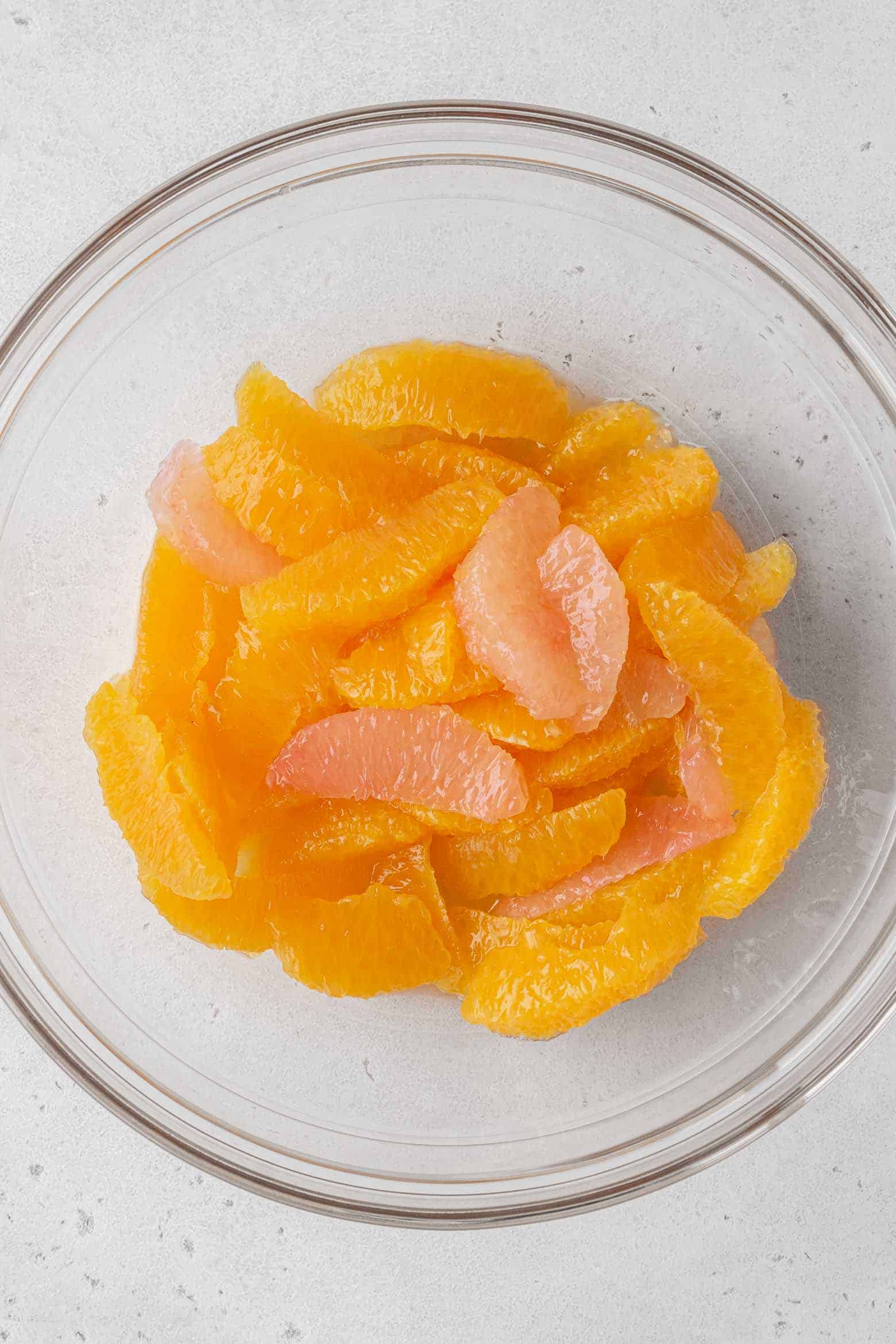 Orange segments in a glass bowl