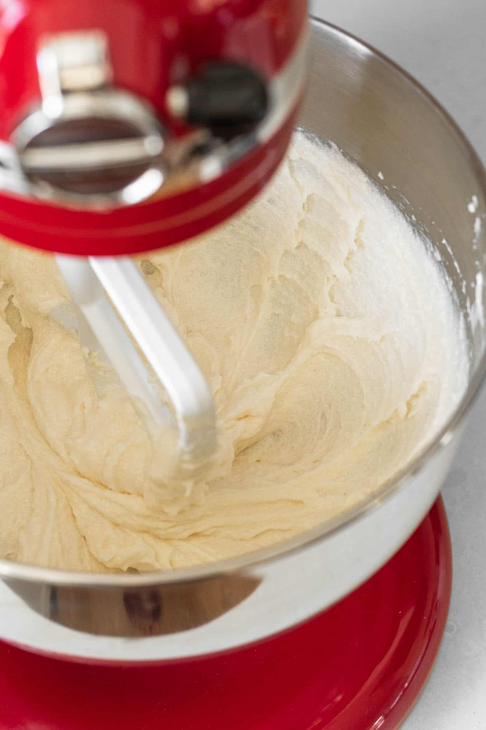 Cream the butter and sugar in the bowl of a stand mixer.