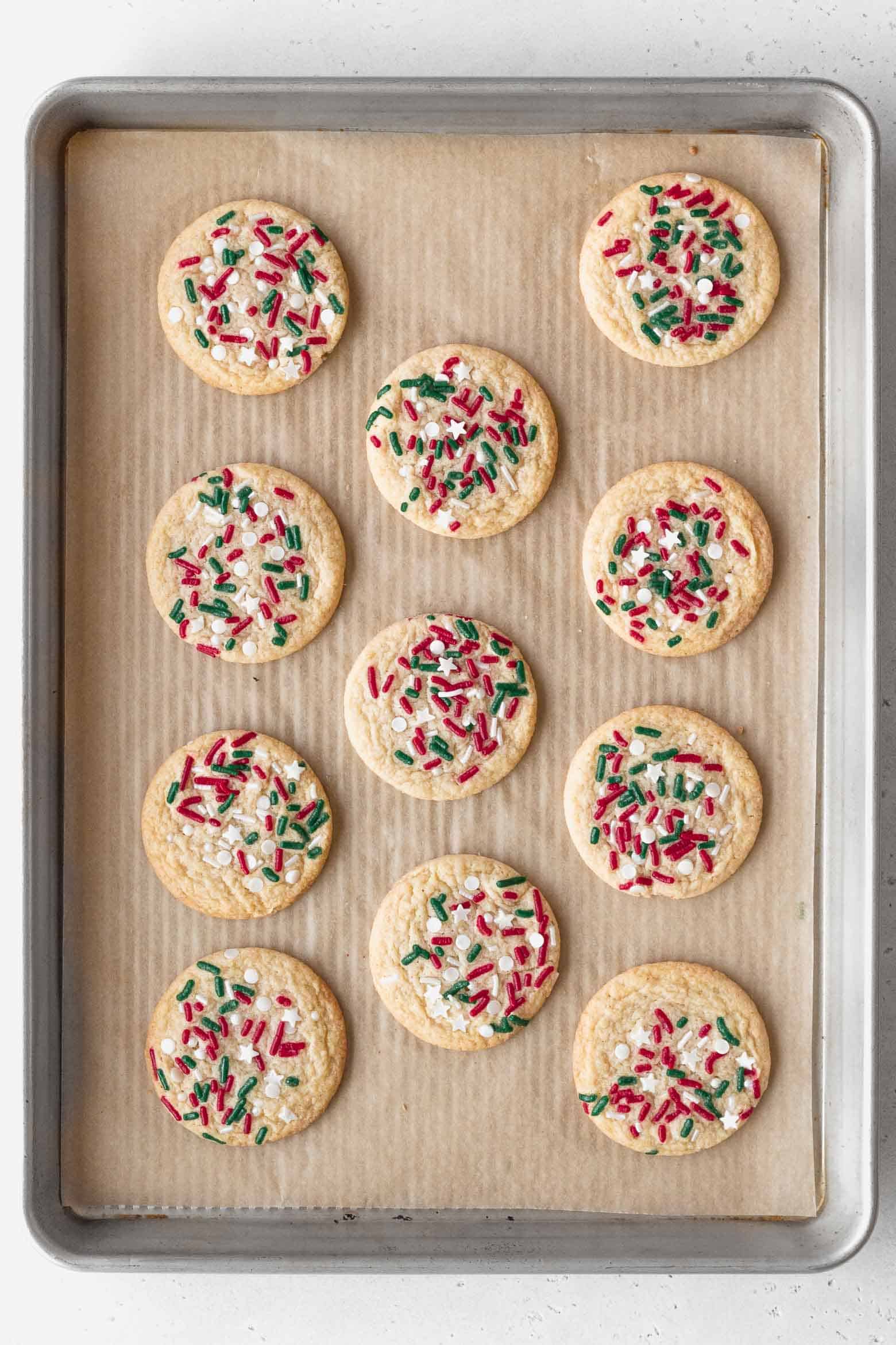Baked Christmas cookies on a baking sheet.