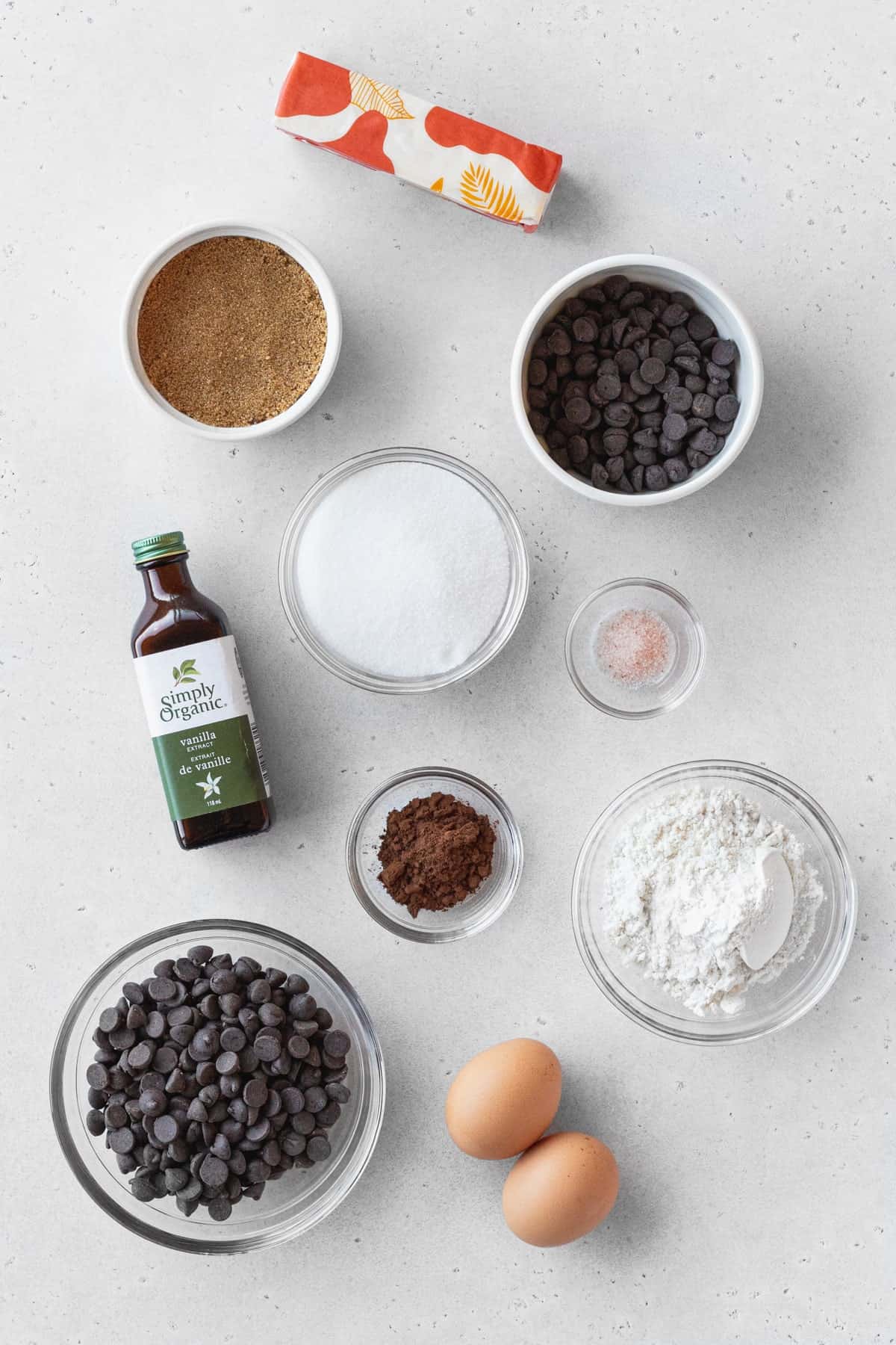 Ingredients for making fudgy gluten-free brownies measured out into bowls.