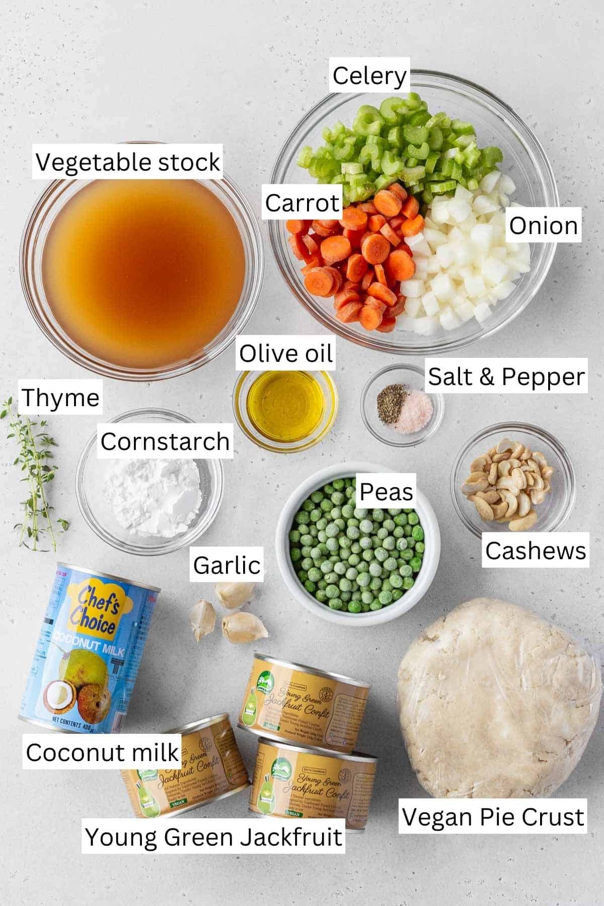 Ingredients for making vegan chicken pot pie measured out into bowls.