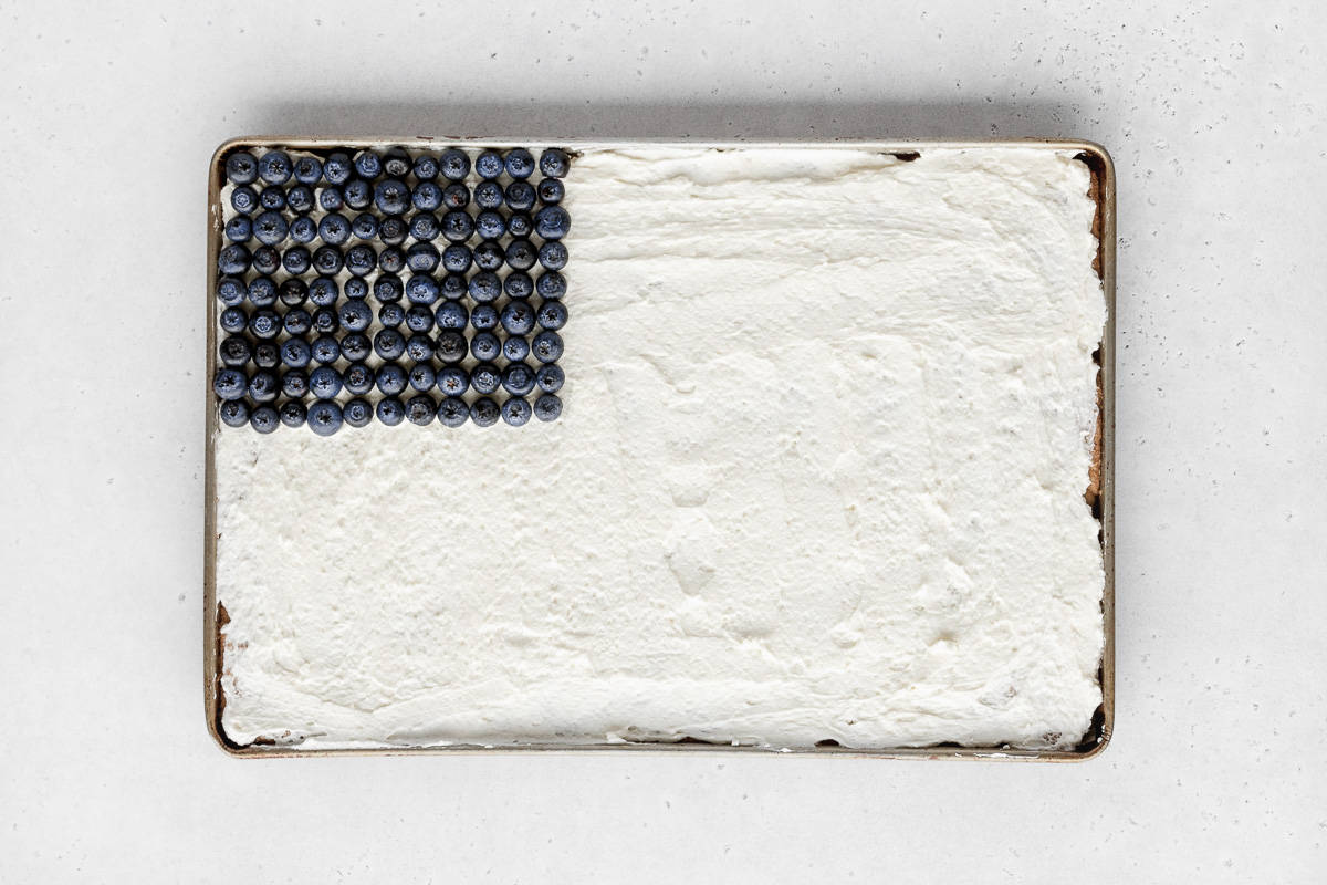blueberries added to upper left quadrant of the sheet pan to represent the stars portion of the american flag.
