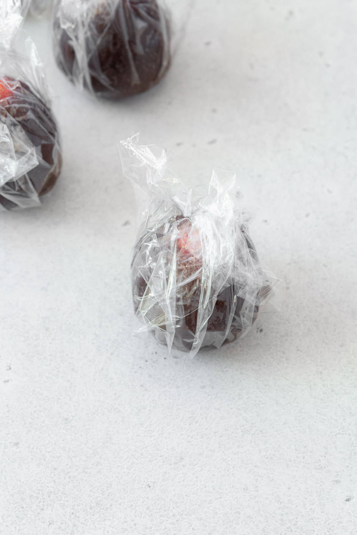 Anko wrapped strawberry wrapped in plastic wrap to prevent it from drying.